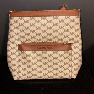 Michael Kors Morgan Messenger bag with strap. Never used. Brand new.
